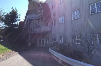 The path from the parking spaces to the Gristmill's first-floor entry.