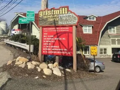The Gristmill Corporate Center sign on Bellevue Road, with Dr. Brian A. Borodaty listed at the top.