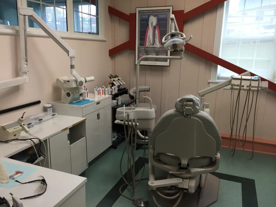 One of the four open-air operatories at A.I.R. Dentalplex, light from the barn windows.