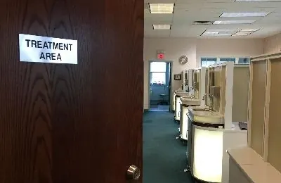 The door marked Treatment Area opening onto the operatories at A.I.R. Dentalplex.